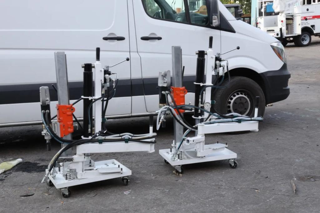 Pair of core drill rigs beside Mercedes Sprinter van