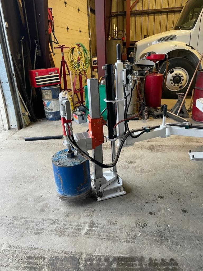 Core drill rig in garage workshop setting