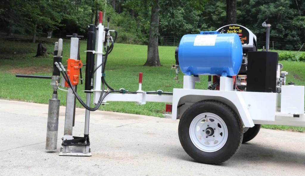 Core drill rig on trailer with water tank